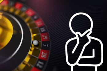 Loptica na točku za rulet i ilustracija osobe koja razmišlja